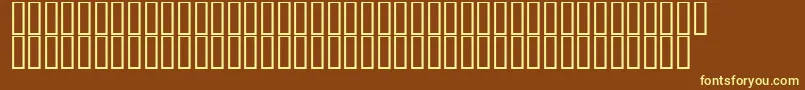 DecibelDingbats-fontti – keltaiset fontit ruskealla taustalla