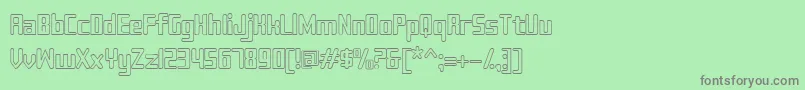 フォントSujetaoutline – 緑の背景に灰色の文字