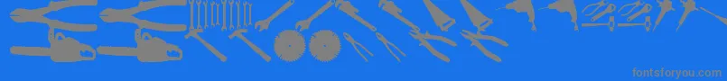 Czcionka ToolzTfb – szare czcionki na niebieskim tle