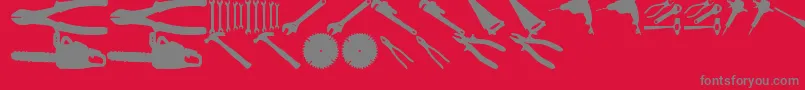 Czcionka ToolzTfb – szare czcionki na czerwonym tle