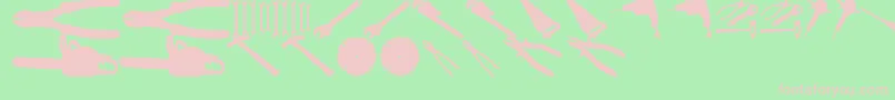 フォントToolzTfb – 緑の背景にピンクのフォント