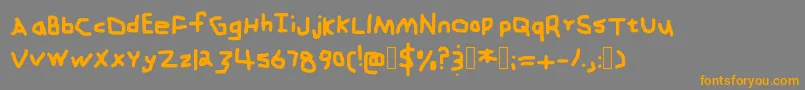 フォントZehkfont – オレンジの文字は灰色の背景にあります。