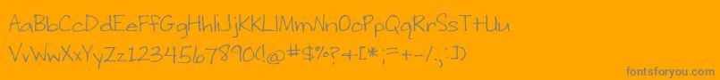 フォントWritingStuff – オレンジの背景に灰色の文字
