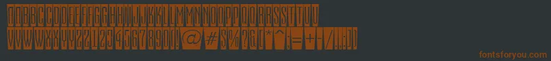 Шрифт EmpirialcmfshRegular – коричневые шрифты на чёрном фоне