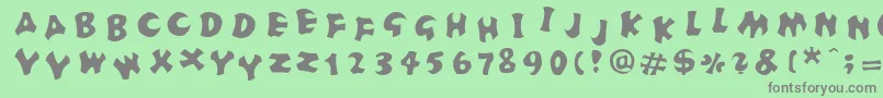FrutigerstonesPositiv-Schriftart – Graue Schriften auf grünem Hintergrund