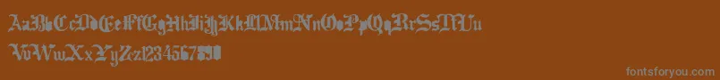 フォントDramatype – 茶色の背景に灰色の文字