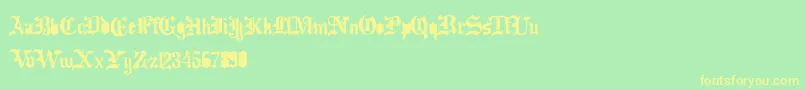フォントDramatype – 黄色の文字が緑の背景にあります