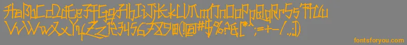フォントKonfuc – オレンジの文字は灰色の背景にあります。
