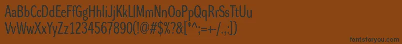 フォントDynagroteskrc – 黒い文字が茶色の背景にあります