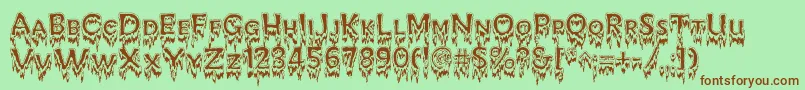 KreepshowFrigid Font – Brown Fonts on Green Background