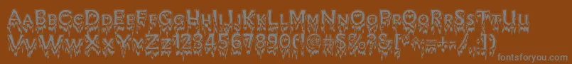 KreepshowFrigid Font – Gray Fonts on Brown Background