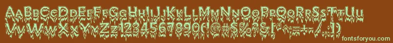 KreepshowFrigid-fontti – vihreät fontit ruskealla taustalla