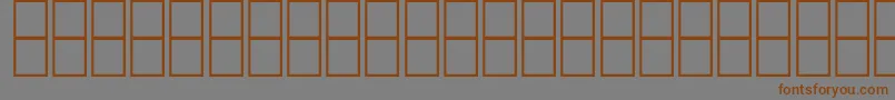 AlMujahedAlAnbobi-Schriftart – Braune Schriften auf grauem Hintergrund