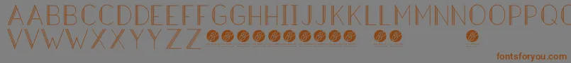 HazeldecolightRegular Font – Brown Fonts on Gray Background