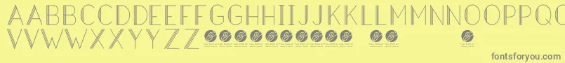 HazeldecolightRegular Font – Gray Fonts on Yellow Background