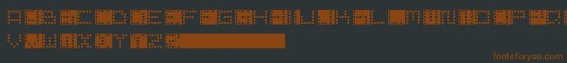 Fonte PixelPoint – fontes marrons em um fundo preto