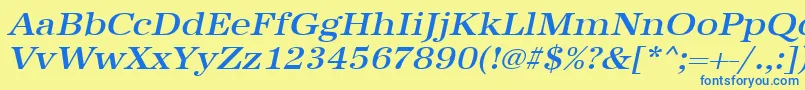 UrwantiquatmedextwidOblique Font – Blue Fonts on Yellow Background
