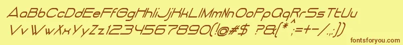DancingJuiceNormalItalic-fontti – ruskeat fontit keltaisella taustalla