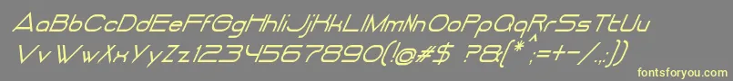 DancingJuiceNormalItalic-fontti – keltaiset fontit harmaalla taustalla