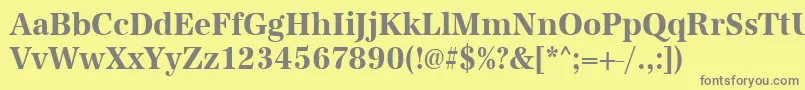 UrwantiquatextnarBold-fontti – harmaat kirjasimet keltaisella taustalla