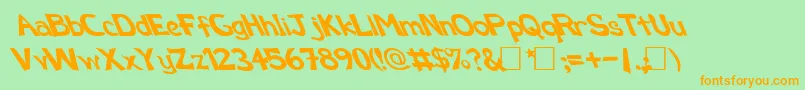 FzBasic12Lefty Font – Orange Fonts on Green Background