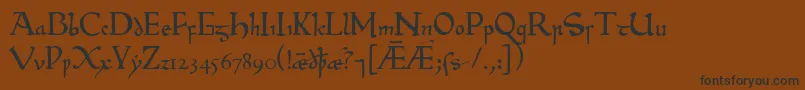 フォントBeowulf – 黒い文字が茶色の背景にあります