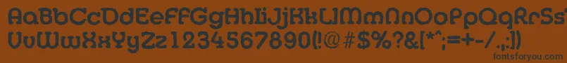 MexicoantiqueBold-fontti – mustat fontit ruskealla taustalla