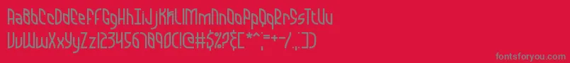 フォントQuarantineBrk – 赤い背景に灰色の文字