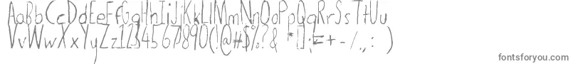 Thedogatemyhomeworklight-fontti – harmaat kirjasimet valkoisella taustalla