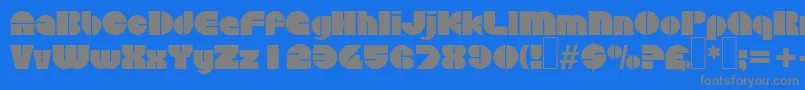 フォントD730DecoRegular – 青い背景に灰色の文字