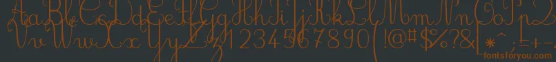 Jbcursive Font – Brown Fonts on Black Background