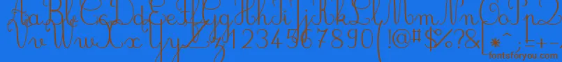 Jbcursive Font – Brown Fonts on Blue Background