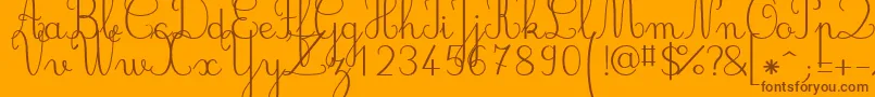 Jbcursive Font – Brown Fonts on Orange Background