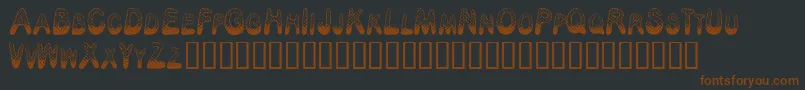 PoisonDots Font – Brown Fonts on Black Background