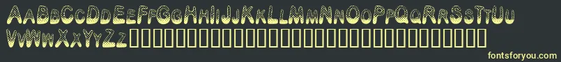 PoisonDots Font – Yellow Fonts on Black Background