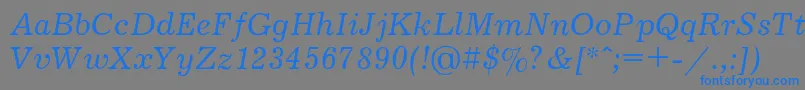 フォントJournali – 灰色の背景に青い文字