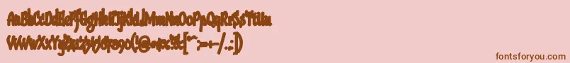 Sudegnakno3a Font – Brown Fonts on Pink Background