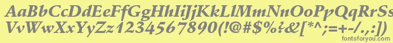 DeutchBlackSsiBlackItalic-Schriftart – Graue Schriften auf gelbem Hintergrund