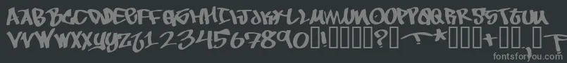 ToBeContinued-fontti – harmaat kirjasimet mustalla taustalla