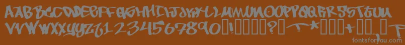 フォントToBeContinued – 茶色の背景に灰色の文字