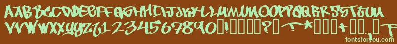 フォントToBeContinued – 緑色の文字が茶色の背景にあります。