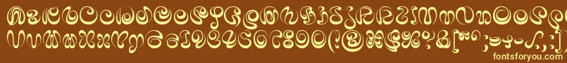 IaiAlphabet-fontti – keltaiset fontit ruskealla taustalla