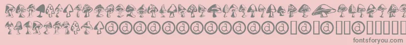 フォントShrooms – ピンクの背景に灰色の文字