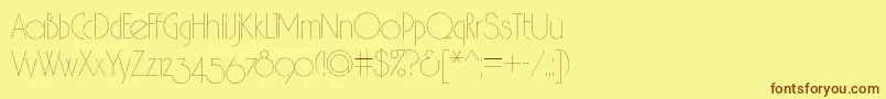 フォントHair2 – 茶色の文字が黄色の背景にあります。