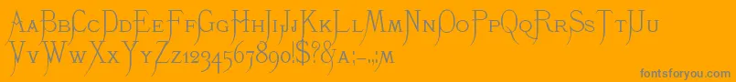 K22Monastic-Schriftart – Graue Schriften auf orangefarbenem Hintergrund