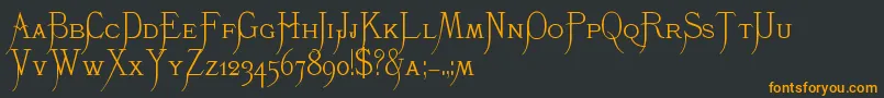 K22Monastic Font – Orange Fonts on Black Background