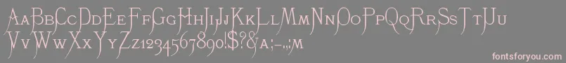 フォントK22Monastic – 灰色の背景にピンクのフォント