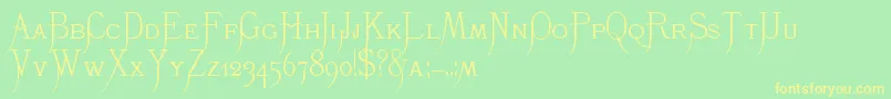 K22Monastic-Schriftart – Gelbe Schriften auf grünem Hintergrund