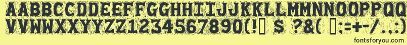 Gommogravure Font – Black Fonts on Yellow Background