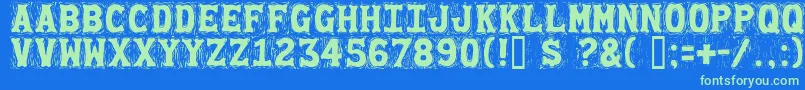 Gommogravure Font – Green Fonts on Blue Background